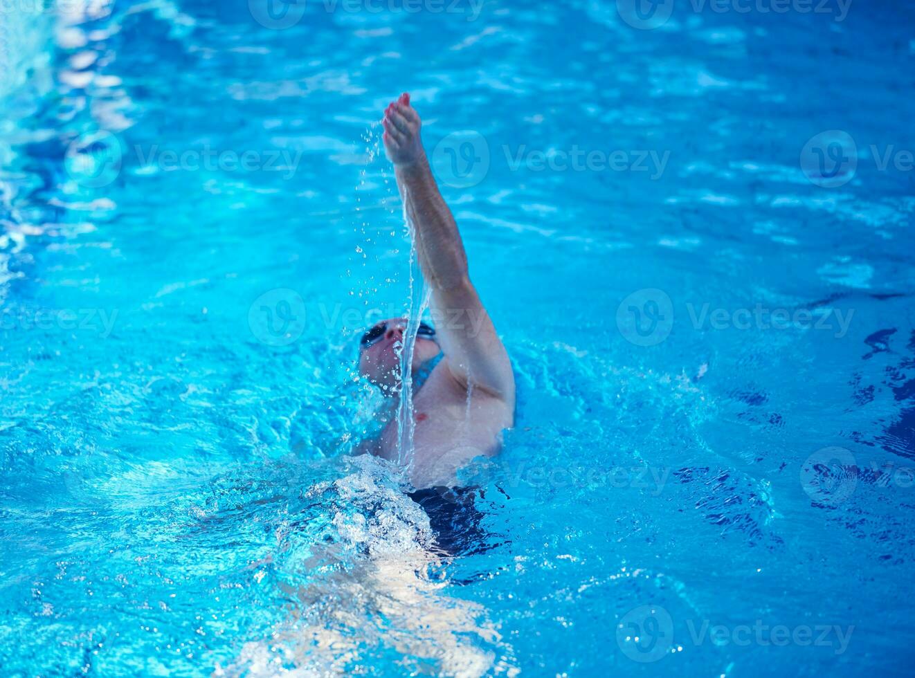 swimmer excercise on indoor swimming poo photo