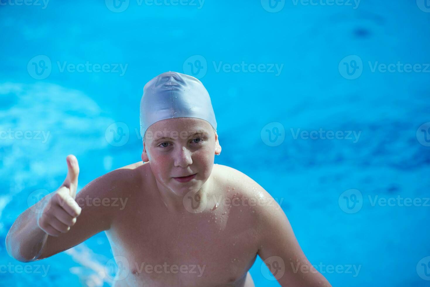 child on swimming poo photo