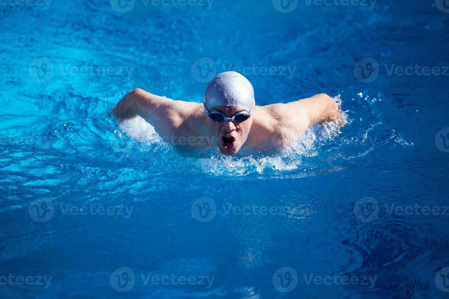 swimmer excercise on indoor swimming poo photo