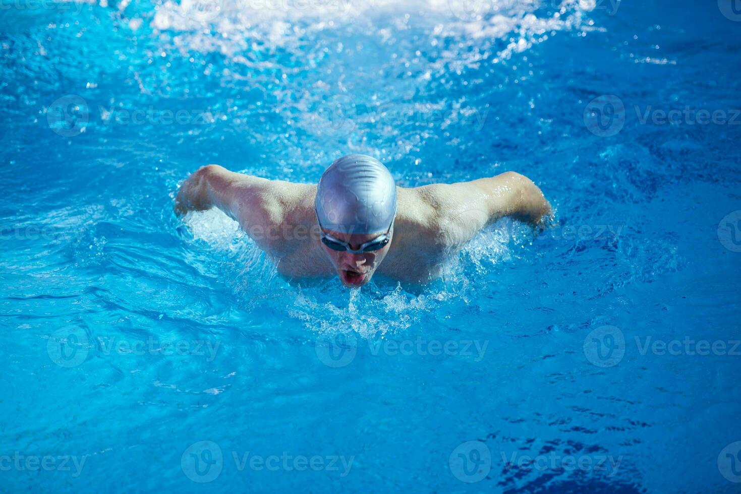 swimmer excercise on indoor swimming poo photo