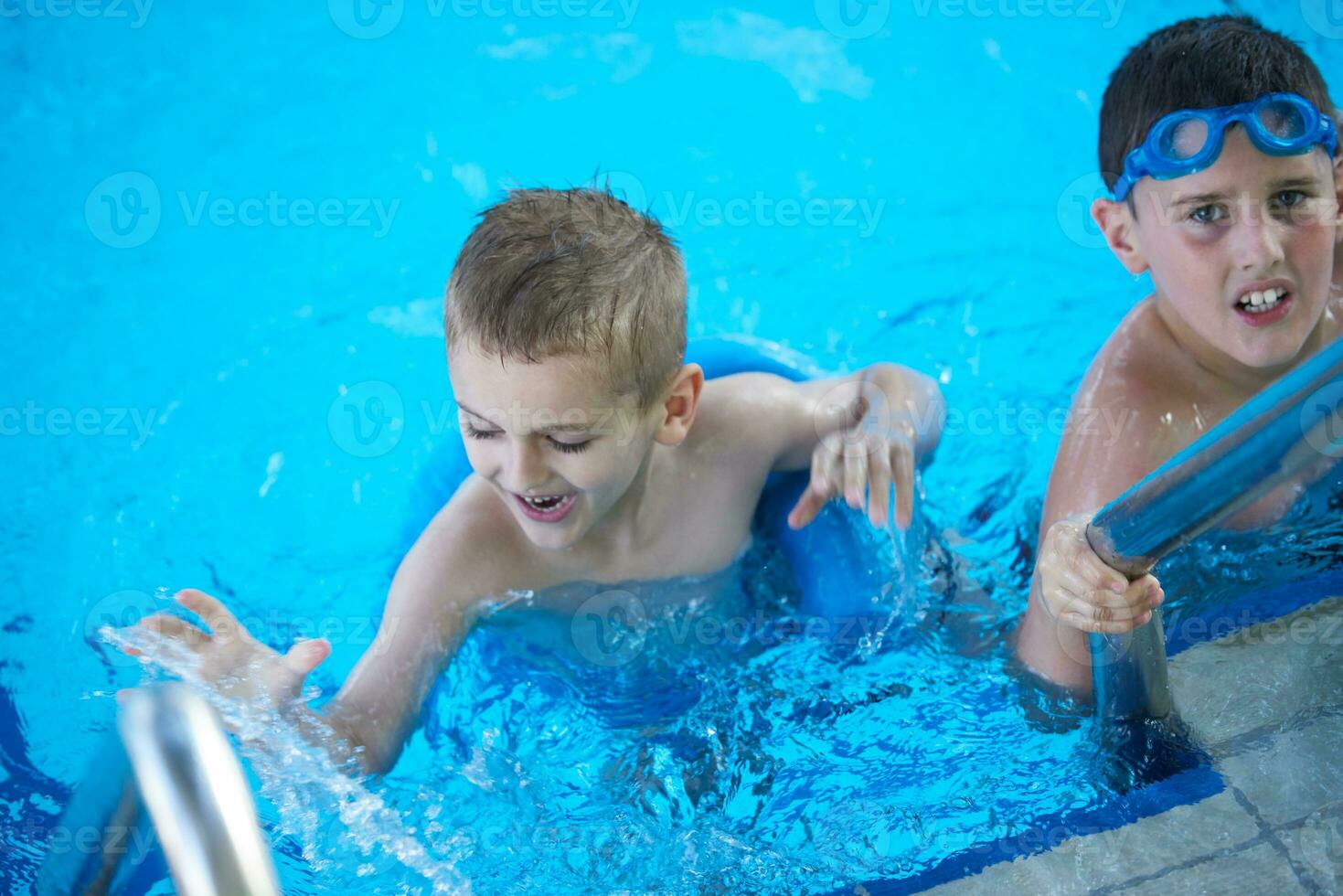 child portrait on swimming pool photo
