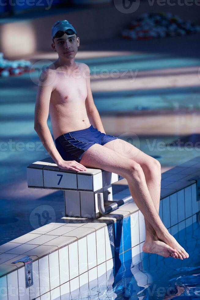 child portrait on swimming pool photo