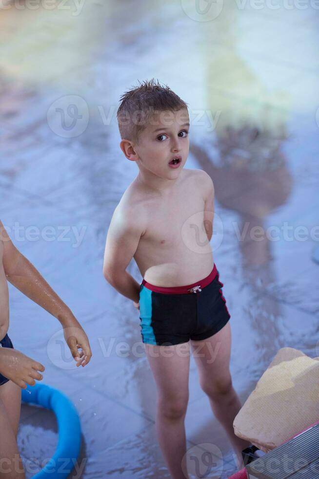 child portrait on swimming pool photo