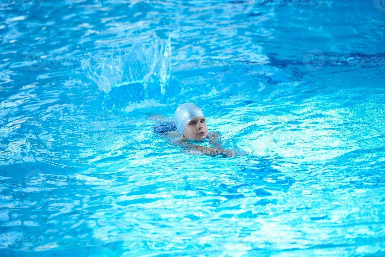 child portrait on swimming pool photo