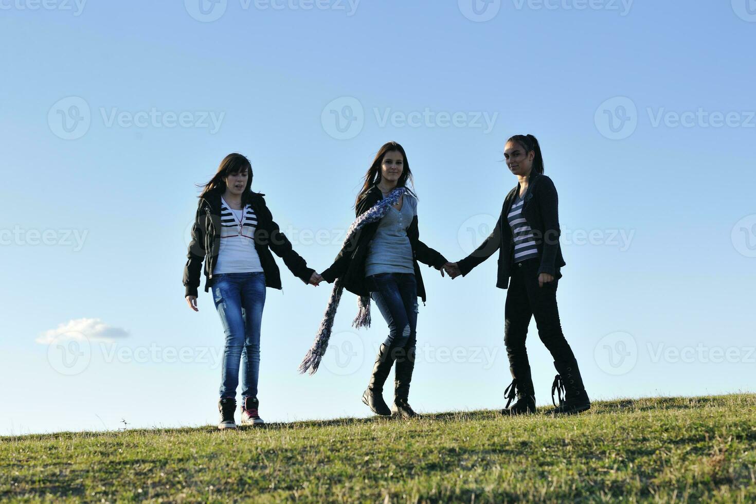 group of teens have fun outdoor photo