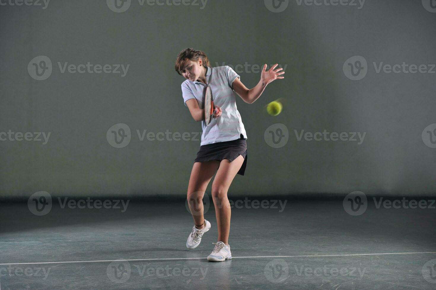 one young woman play tennis photo