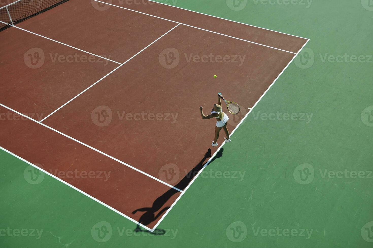 young woman play tennis photo