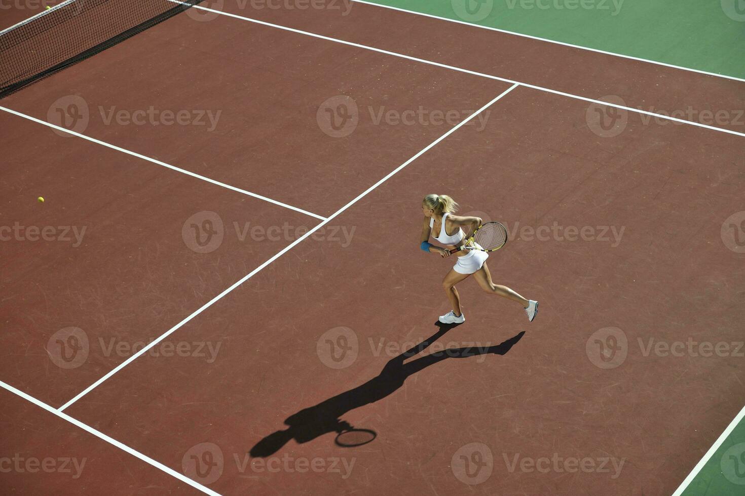 young woman play tennis photo