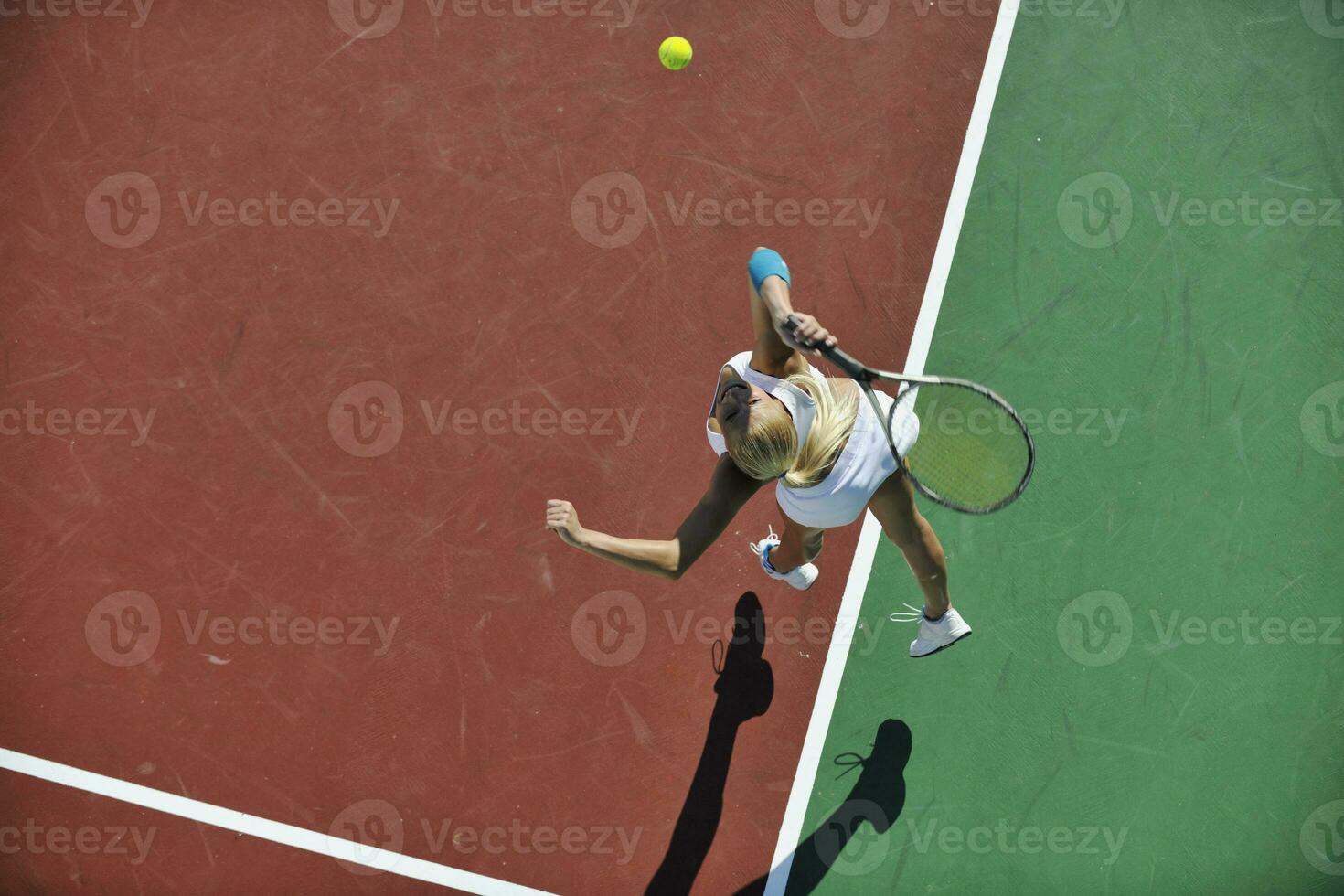 young woman play tennis photo