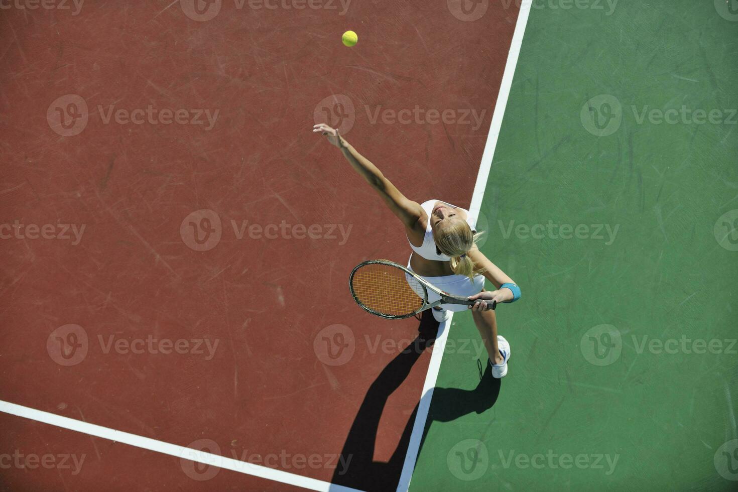 young woman play tennis photo