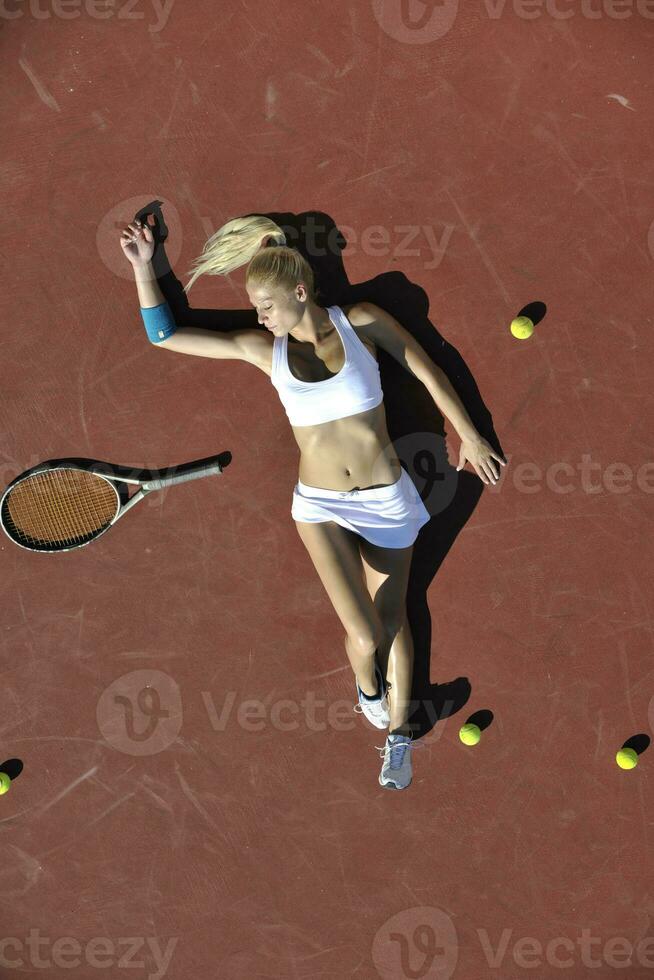 young woman play tennis photo