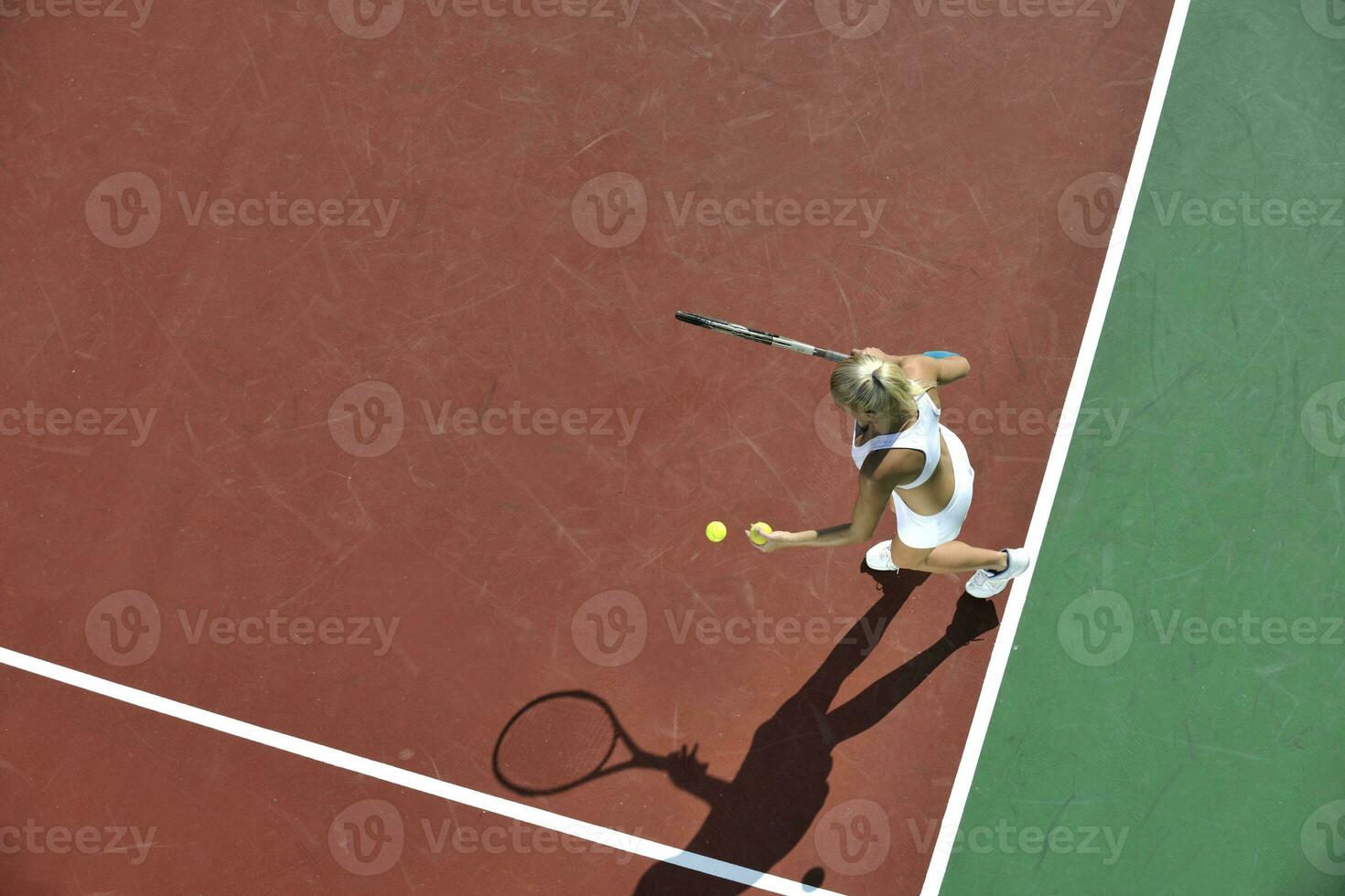 young woman play tennis outdoor photo