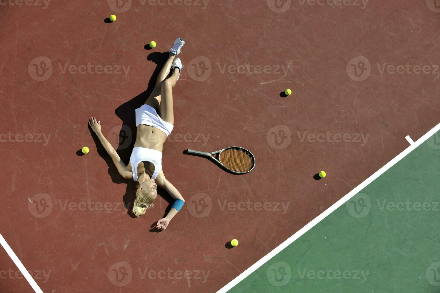 young woman play tennis outdoor photo