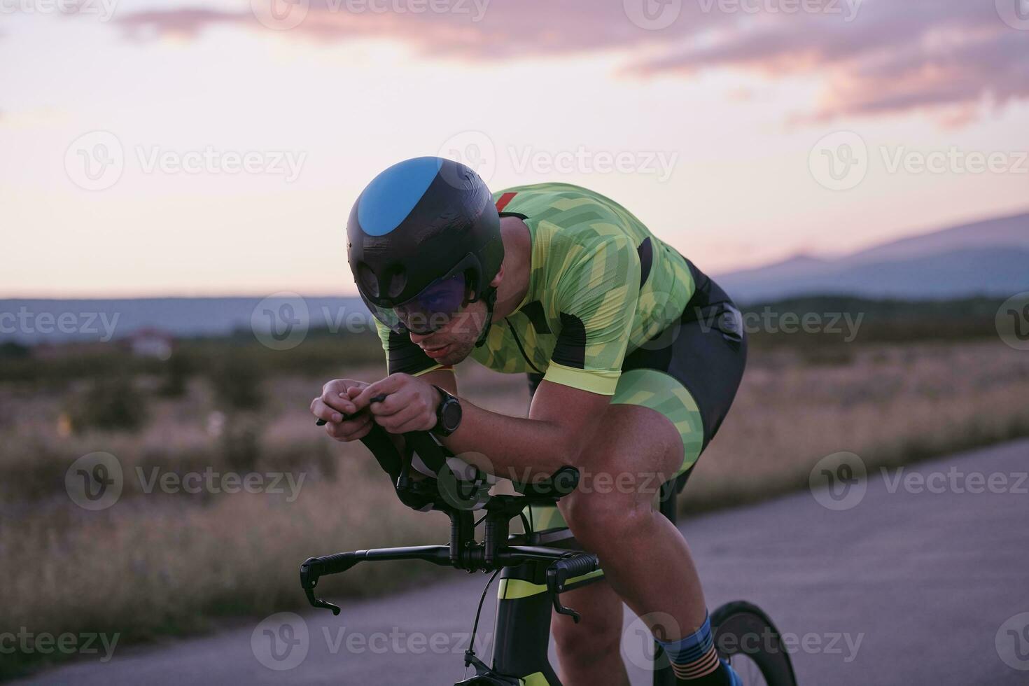 triathlon athlete riding a  bike photo