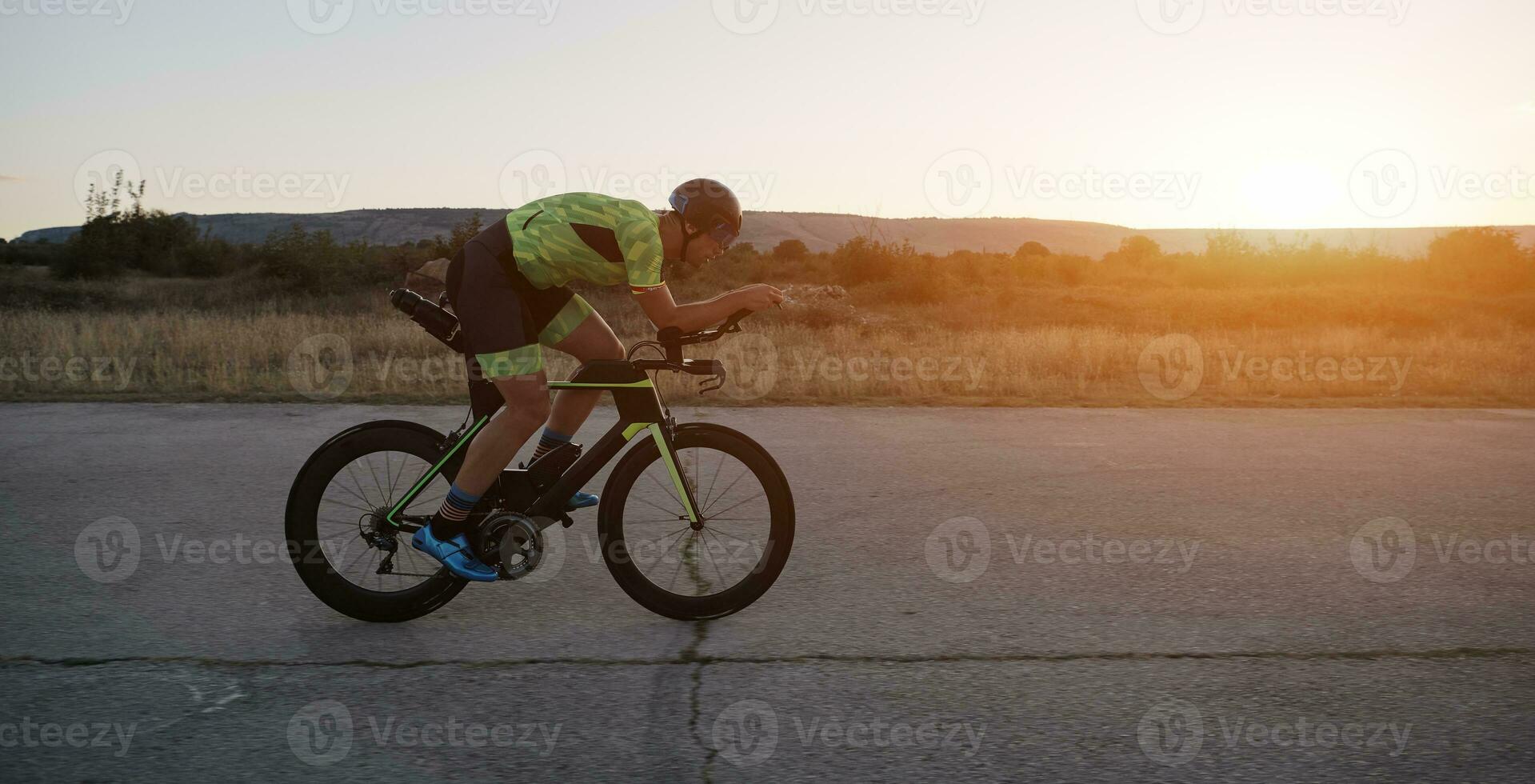 triathlon athlete riding a  bike photo