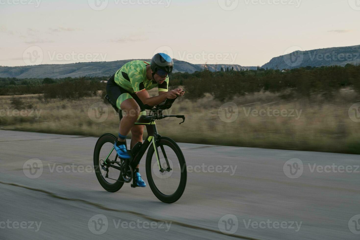 triathlon athlete riding a  bike photo