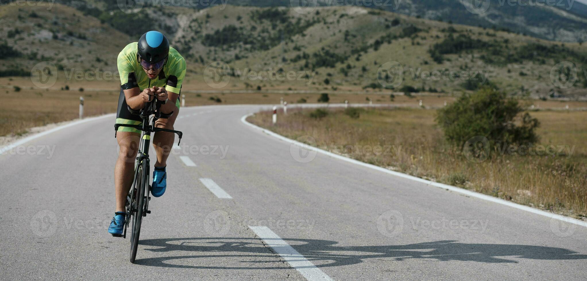 triathlon athlete riding bike photo