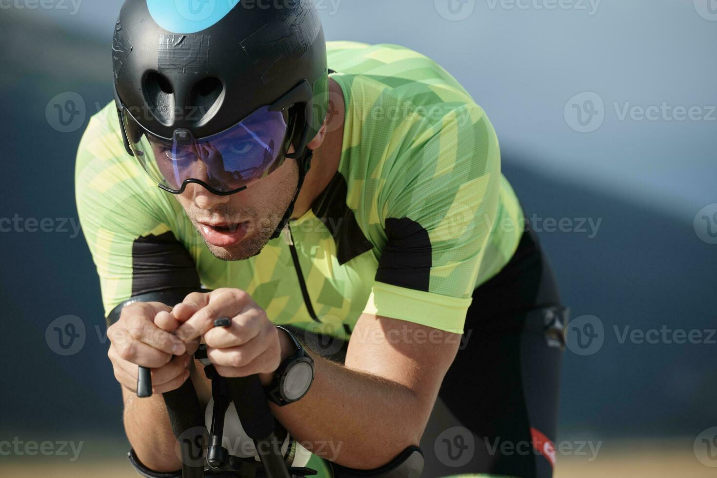 triathlon athlete riding bike photo