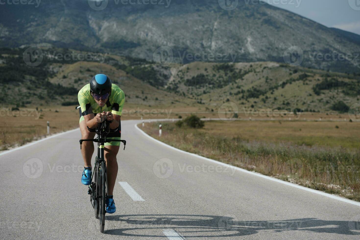 triathlon athlete riding bike photo