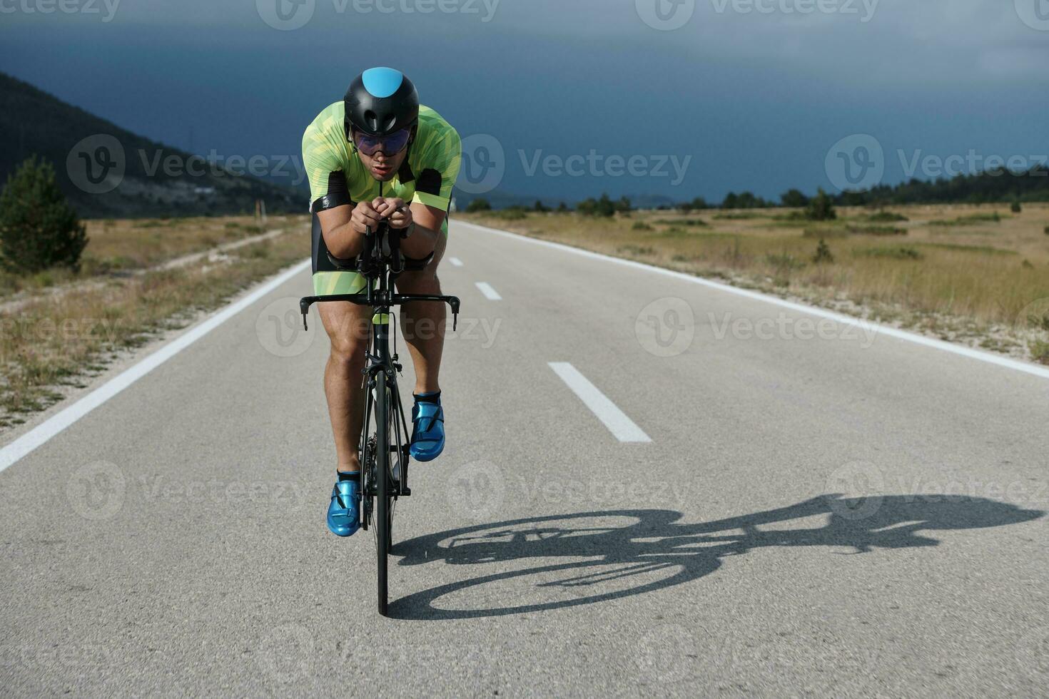 triathlon athlete riding bike photo