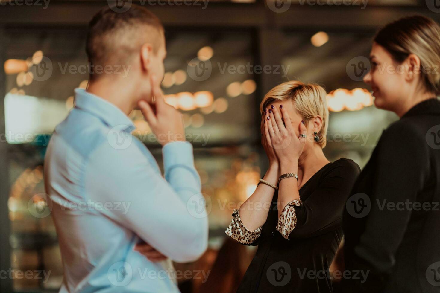 Photo of a business team of young people discussing business ideas in a modern urban environment. Selective focus