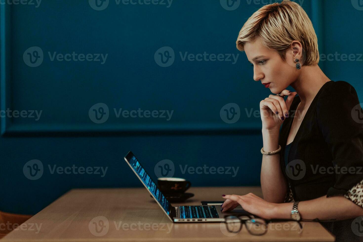 Businesswomen are stressed while working on laptop, Tired businesswoman with headache in coffee shop , feeling sick at work. Selective focus photo