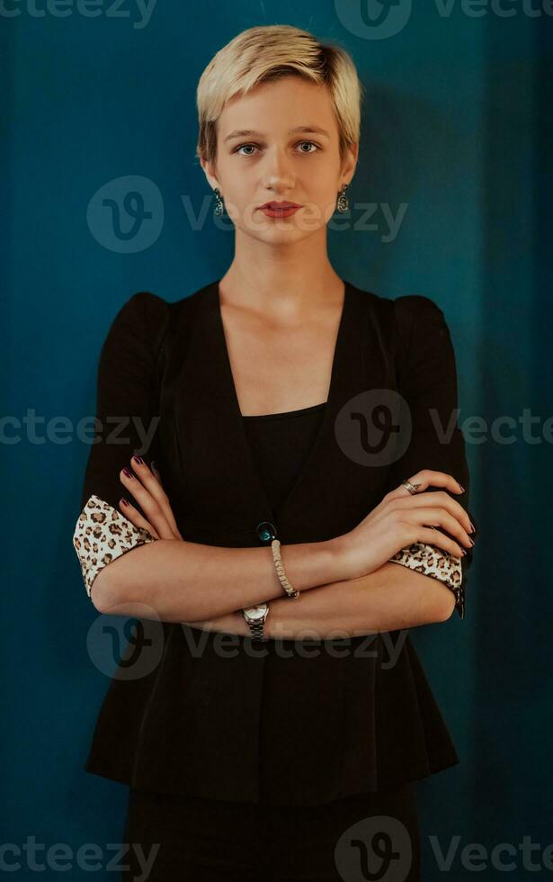 Pretty business woman, successful confidence on modern blue mat background. Selective focus photo