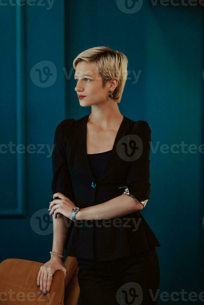 Pretty business woman, successful confidence on modern blue mat background. Selective focus photo