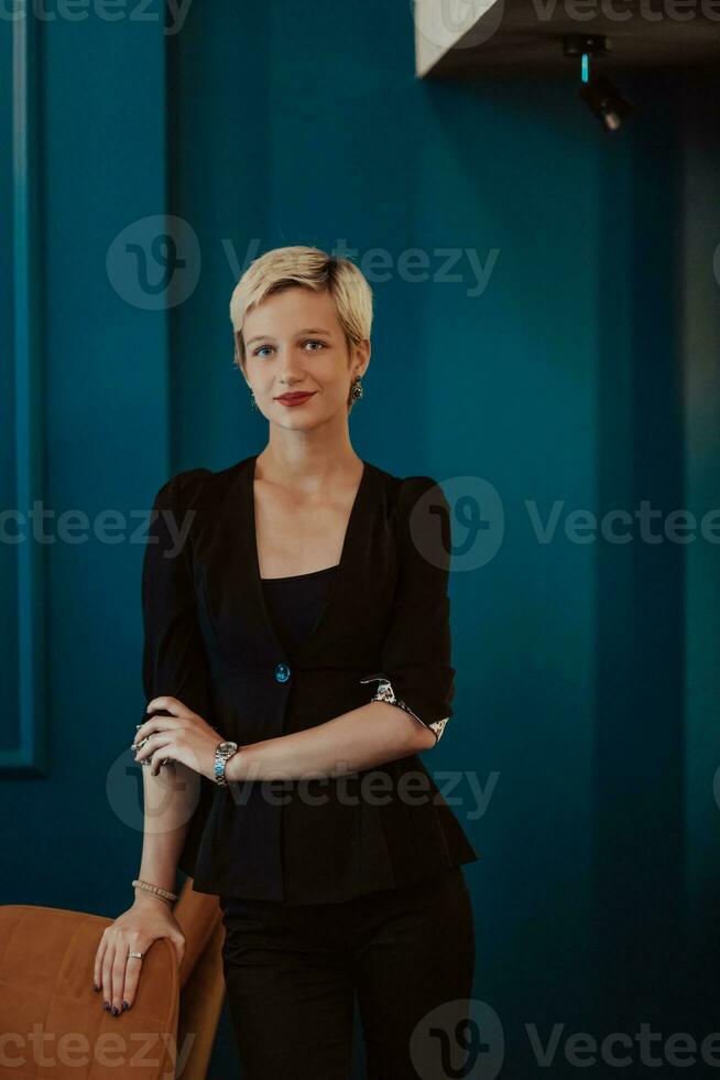 Pretty business woman, successful confidence on modern blue mat background. Selective focus photo