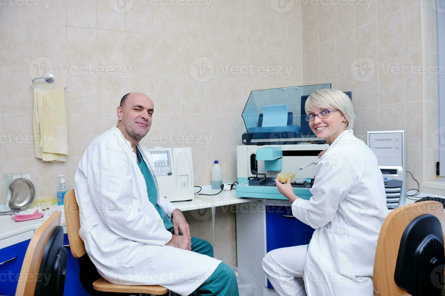 veterinarian and assistant in a small animal clinic photo