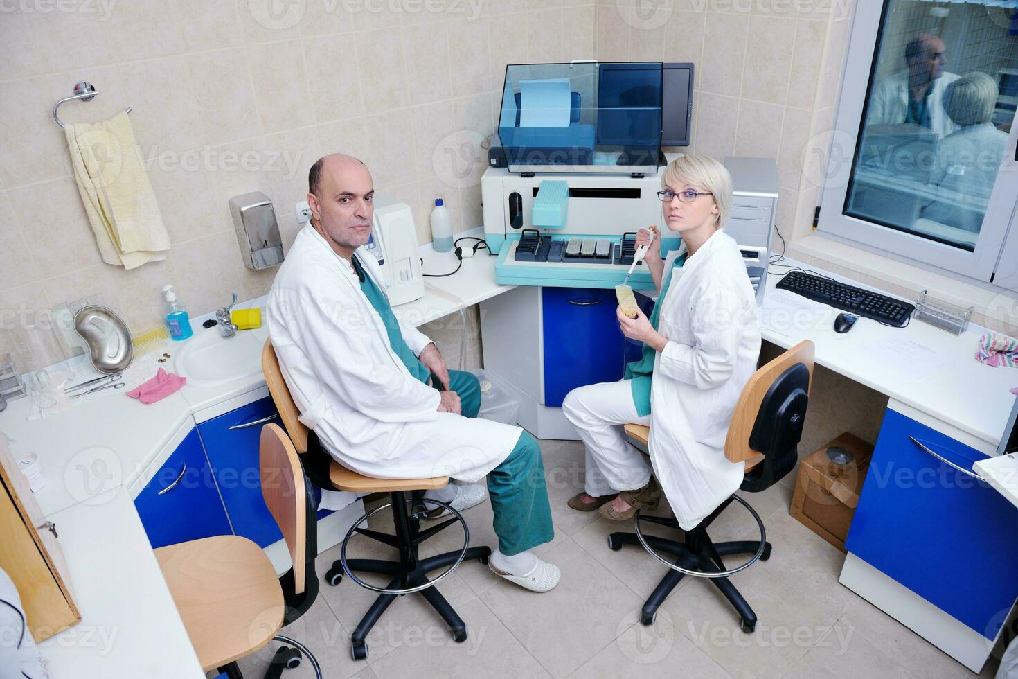 veterinarian and assistant in a small animal clinic photo