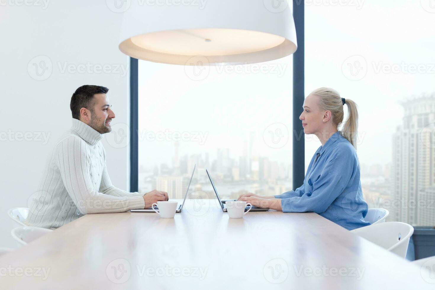 Startup Business Team At A Meeting at modern office building photo