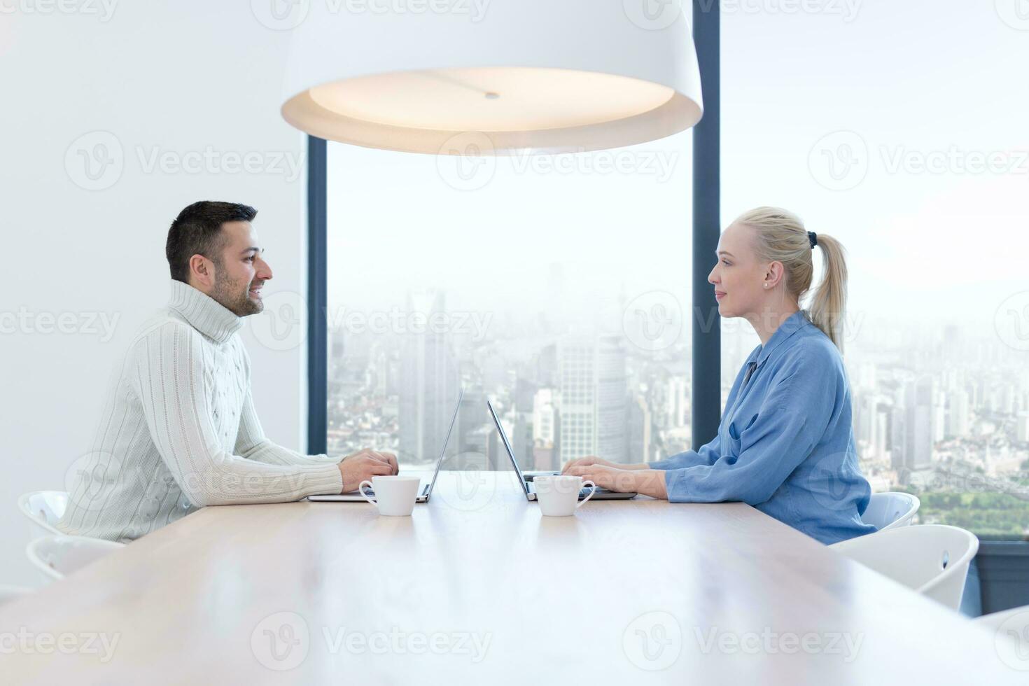 Startup Business Team At A Meeting at modern office building photo