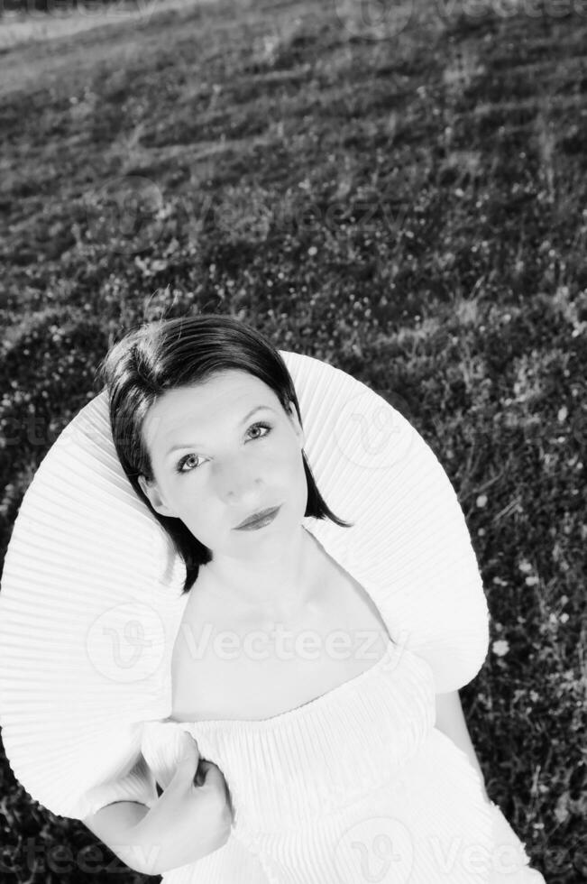 Beautiful bride outdoors in black and white photo