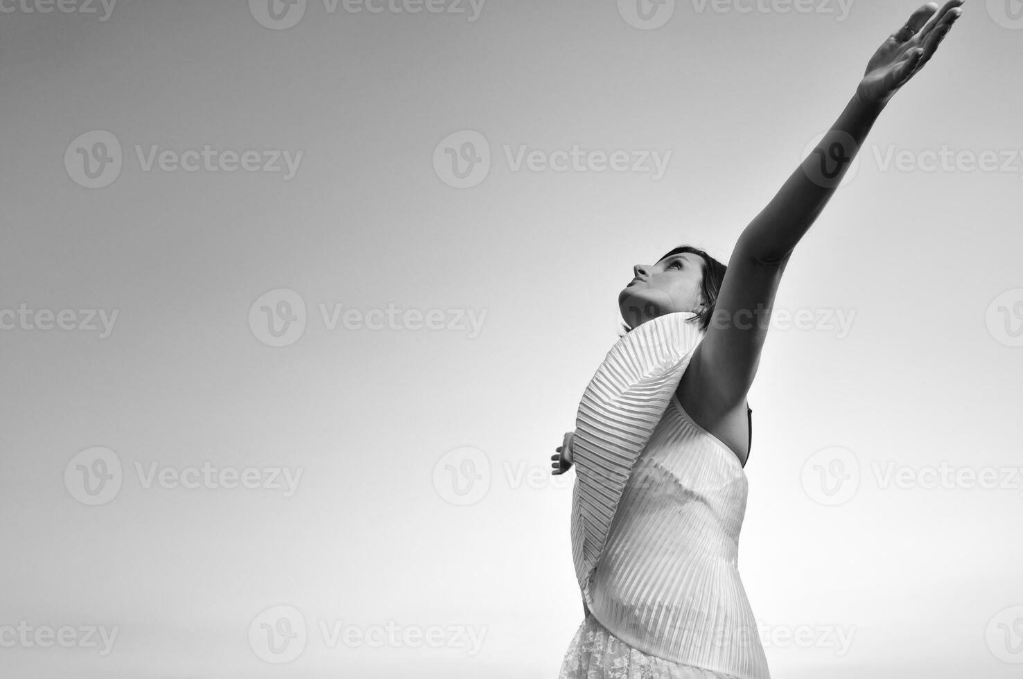 Beautiful bride outdoors in black and white photo