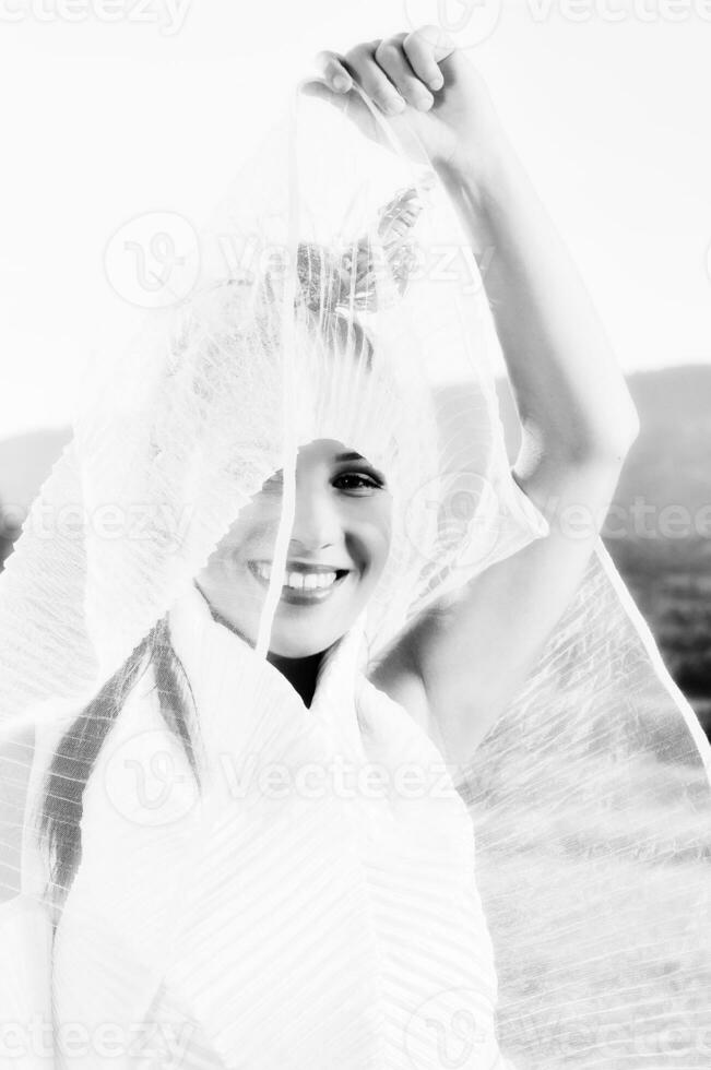 Beautiful bride outdoors in black and white photo