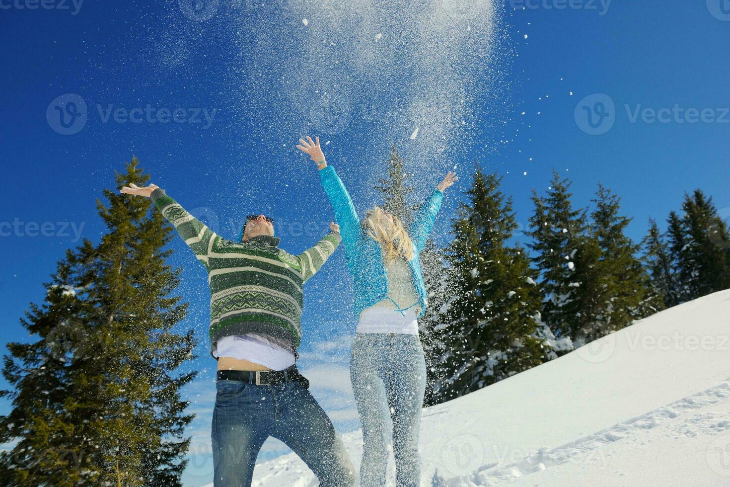 Young Couple In Winter  Snow Scene photo