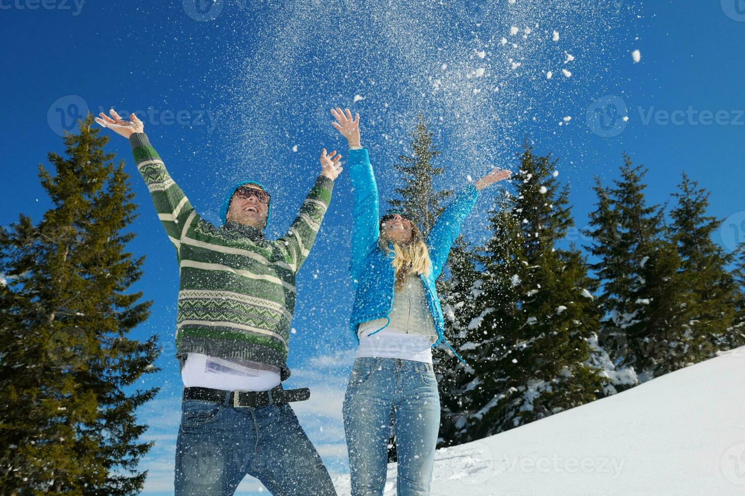 Young Couple In Winter  Snow Scene photo