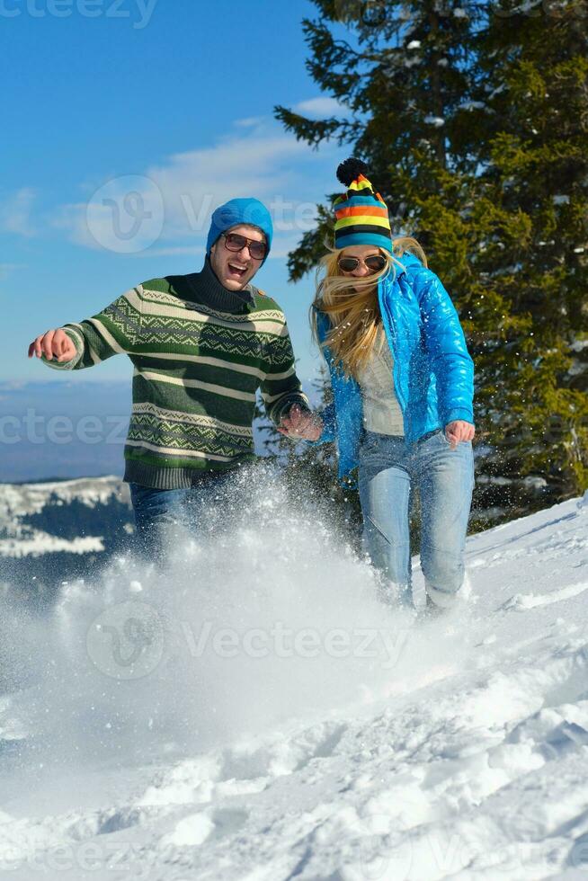 Young Couple In Winter  Snow Scene photo
