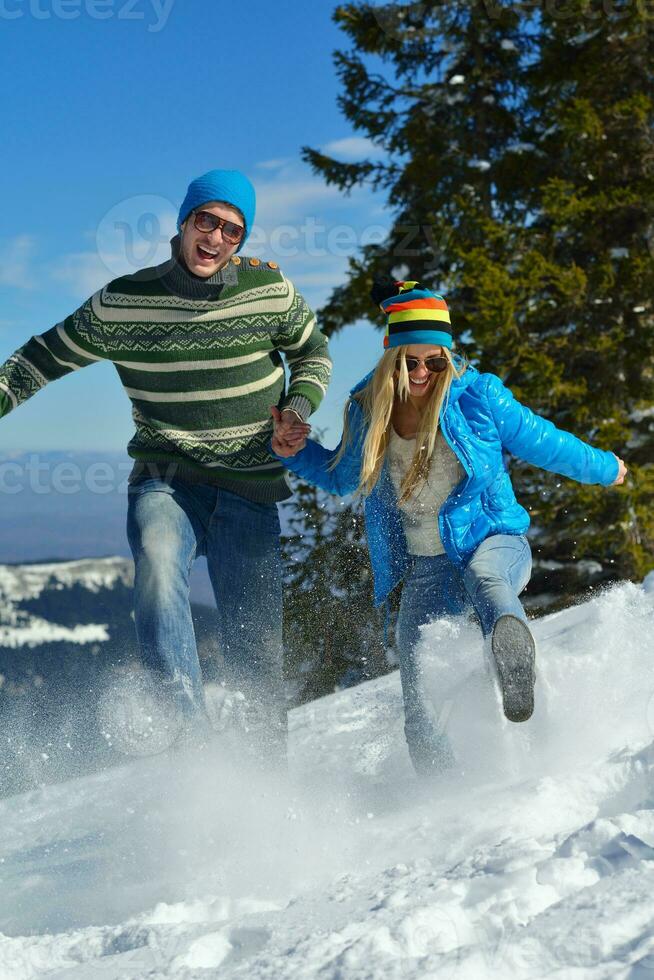 young couple on winter vacation photo