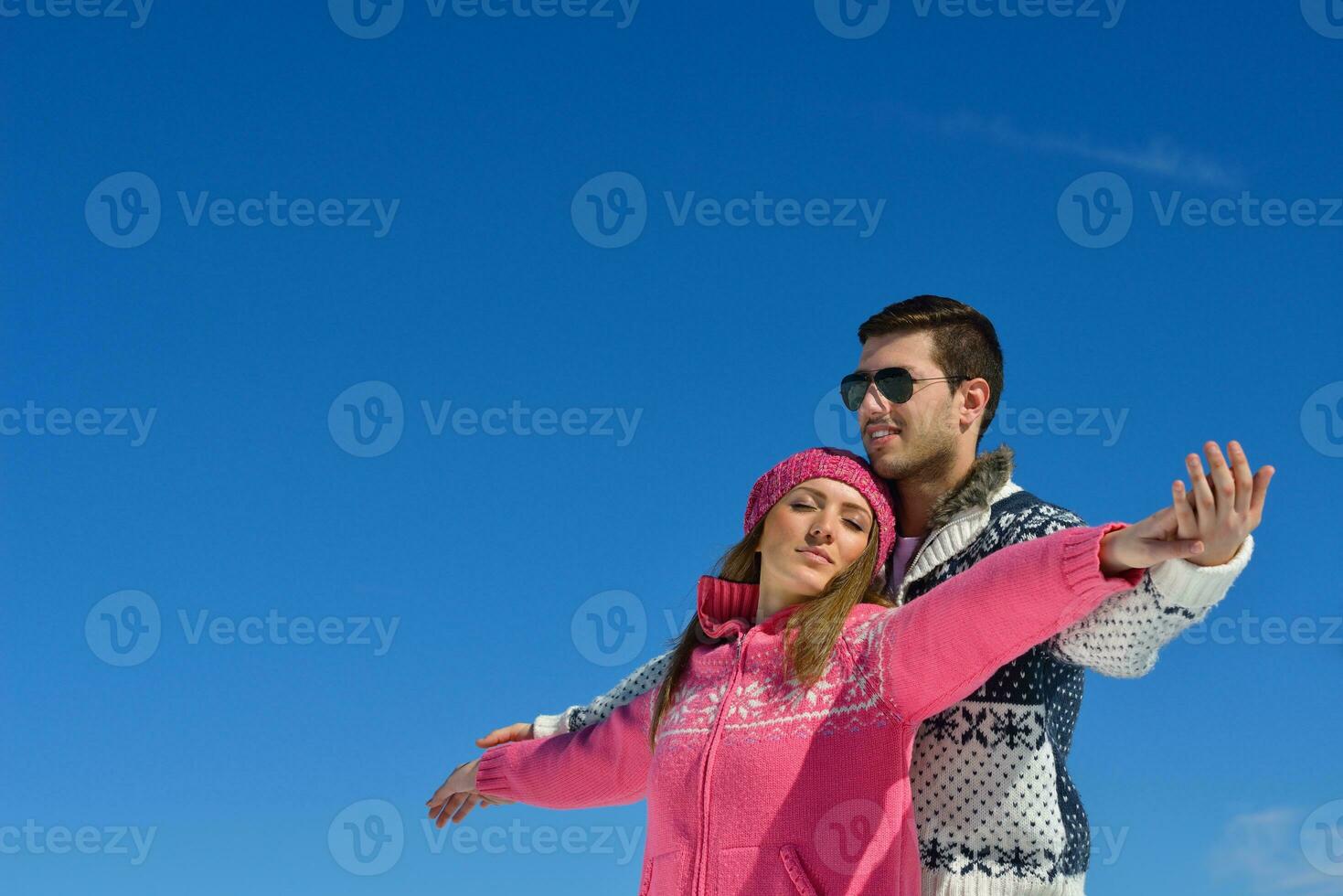 Young Couple In Winter  Snow Scene photo