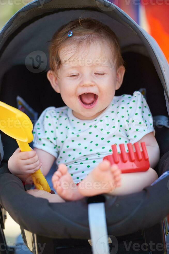 portrait of baby in carriage photo