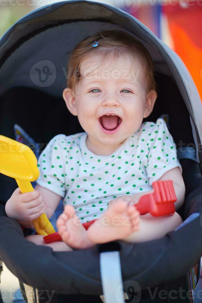 portrait of baby in carriage photo