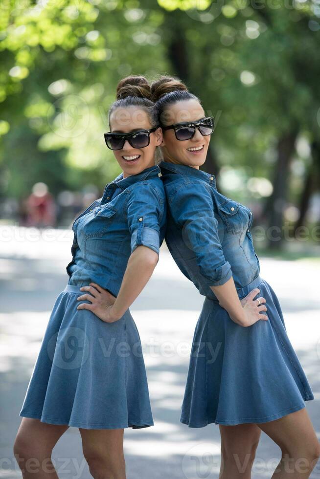 twin sister with sunglasses photo