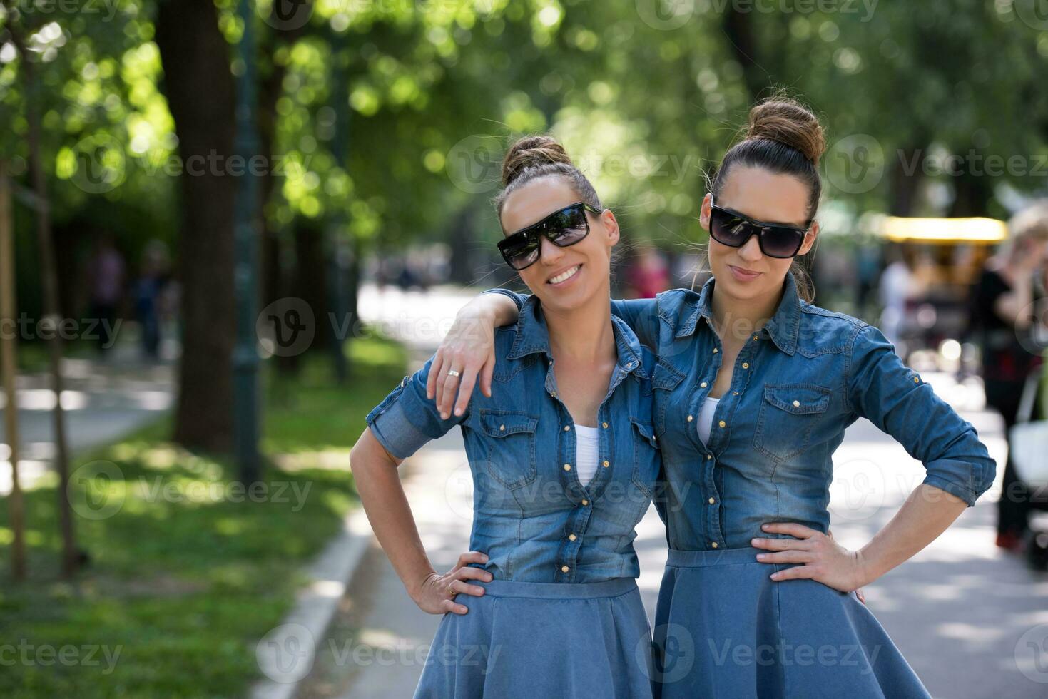 twin sister with sunglasses photo