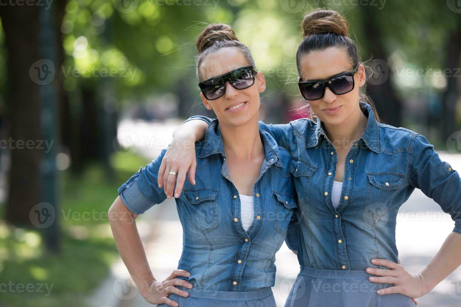 twin sister with sunglasses photo