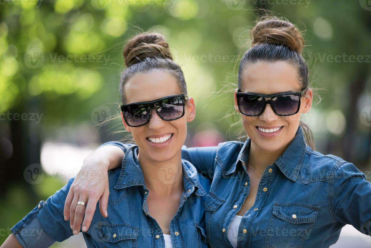 twin sister with sunglasses photo