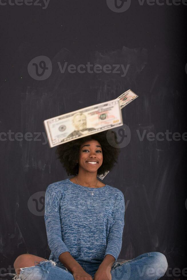 black woman throwing money photo