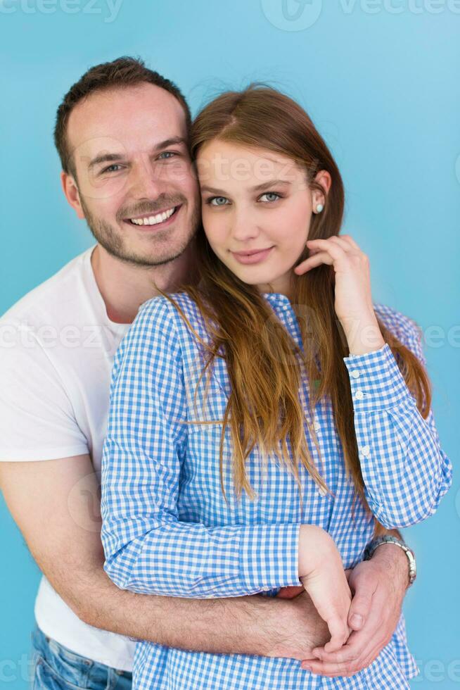 couple isolated on blue Background photo