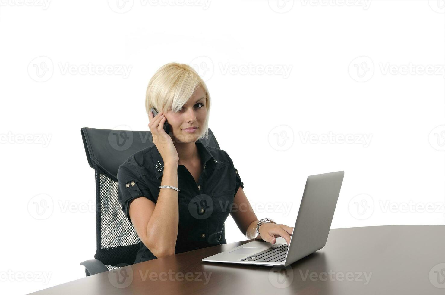 young business woman working in office on laptop photo